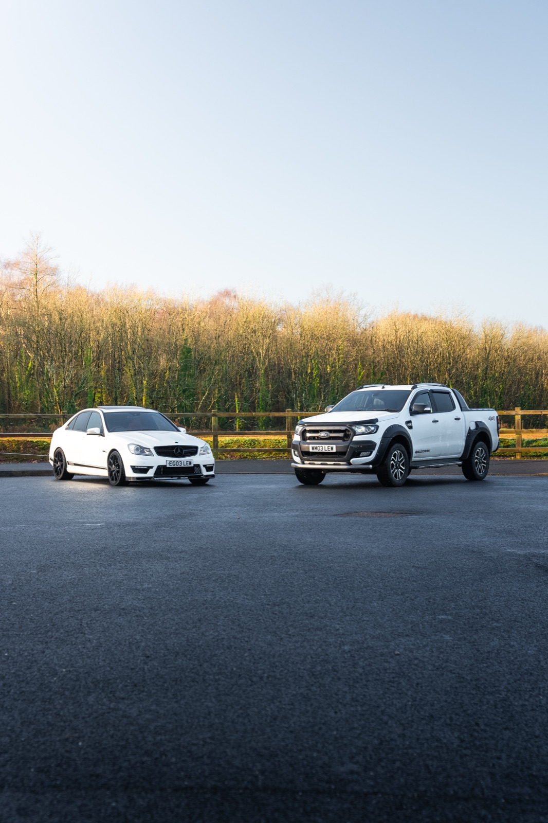 Lewis C63 AMG and Ford Ranger — front three-quarter