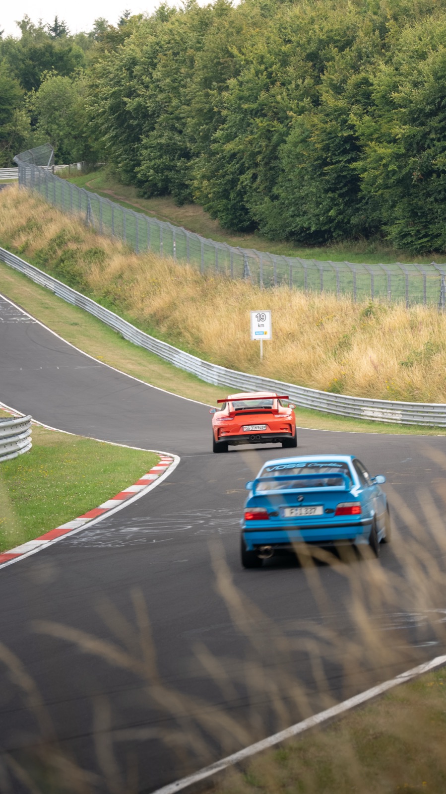 Orange Porsche GT3 RS at the Nürburgring